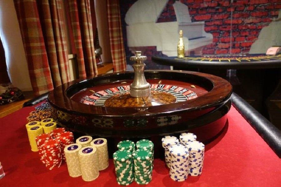 Fun casino roulette wheel with chips ready for a party
